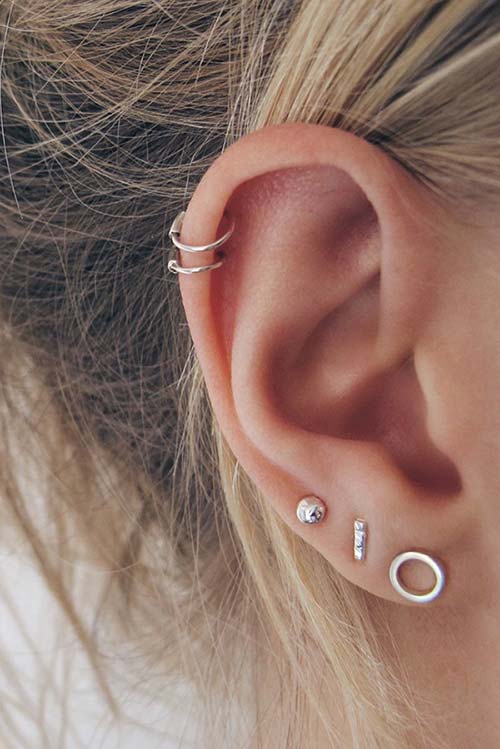 Beautiful Tripple Lobe And Cartilage Ear Piercings