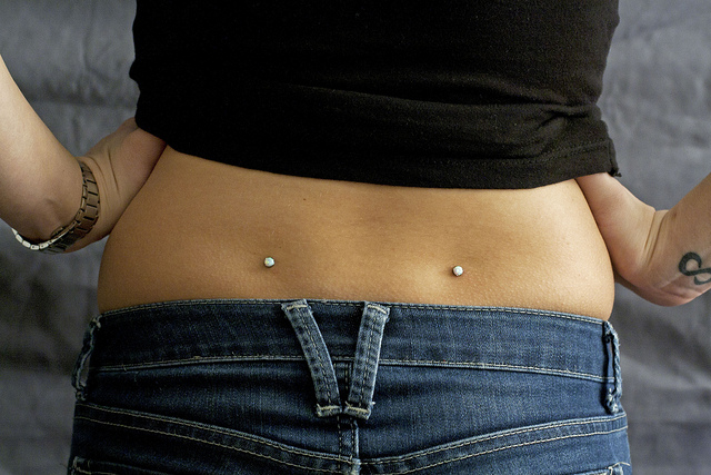 Back Dimple Piercing With Silver Dermals
