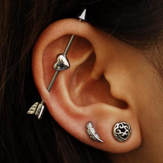 Cool Industrial Piercing With Arrow Barbell And Triple Lobe Piercing
