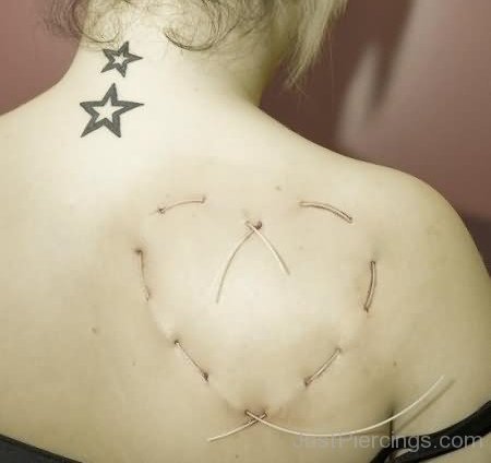 Dermal Anchors Star Piercing On Back Shoulder