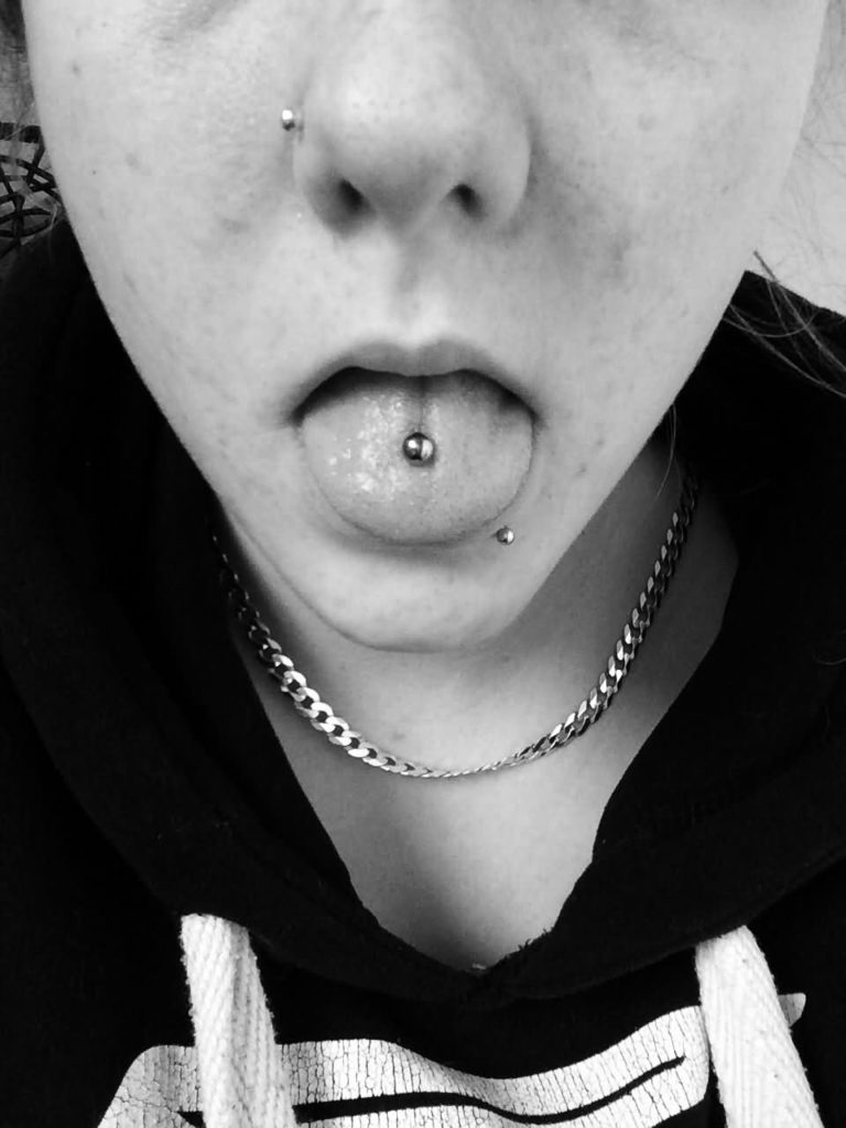 Right Nostril, Lip and Tongue Piercing