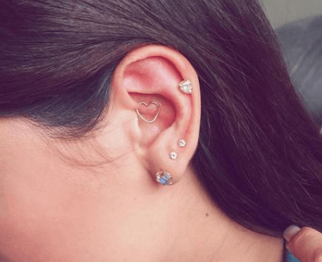 helix-with-needle-and-tragus-lobe-piercing